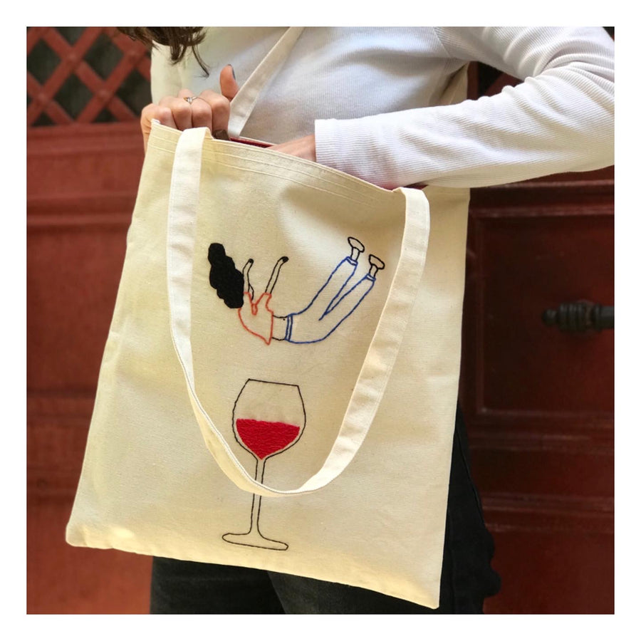 FALLING INTO WINE TOTE BAG