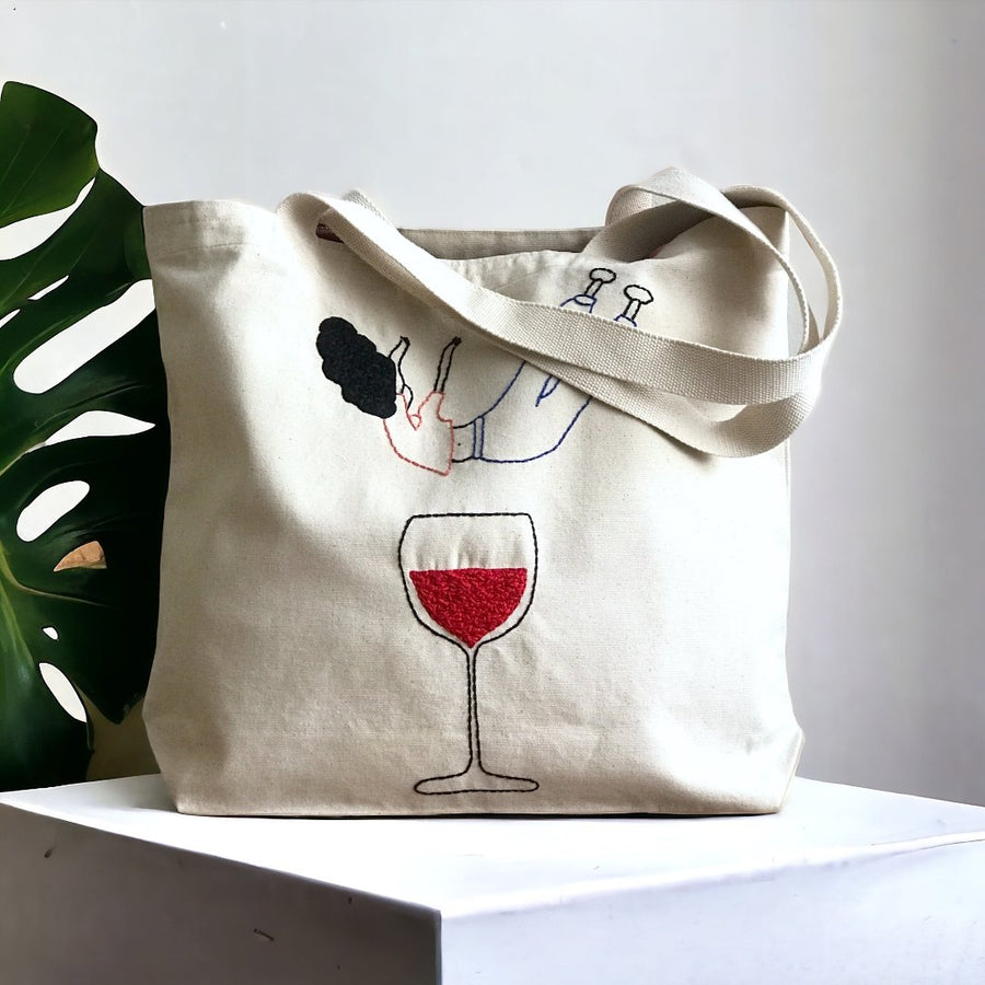 FALLING INTO WINE LARGE TOTE BAG