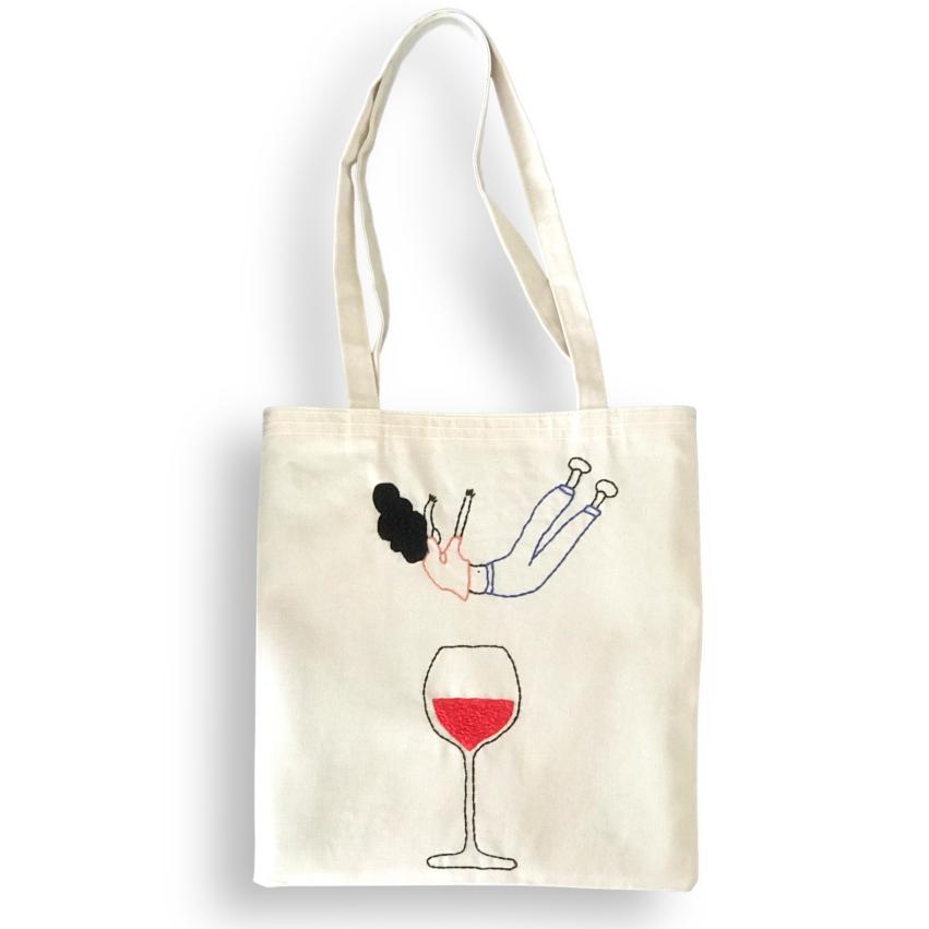 FALLING INTO WINE TOTE BAG